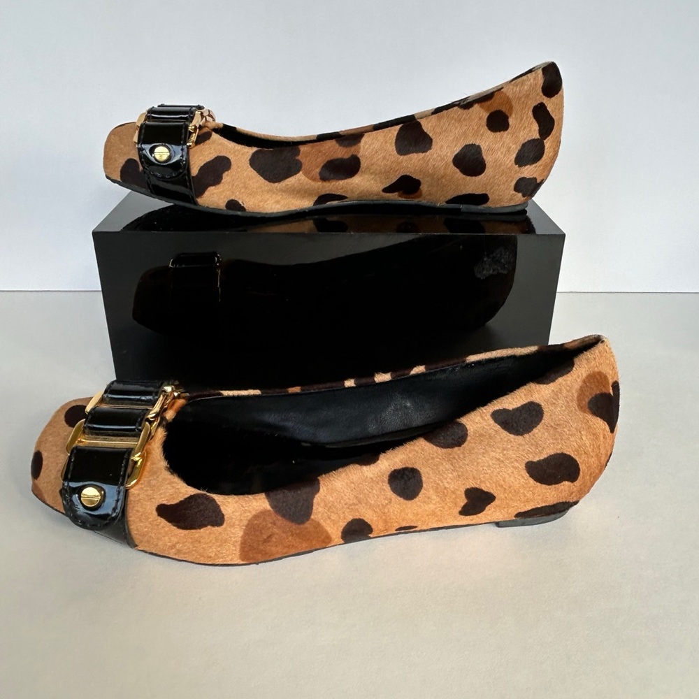 Tory Burch Calf Hair Leopard Print Slip On Loafer with Gold Buckle. 7.5